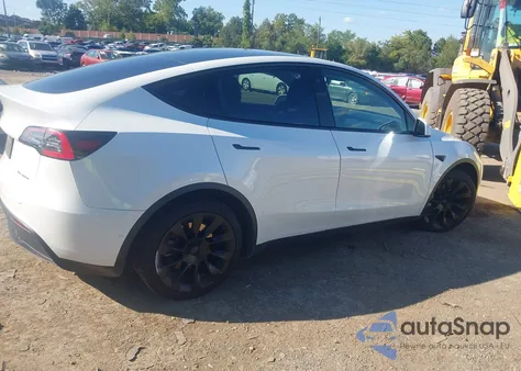 2021 Tesla Model Y Long Range Dual Motor All-Wheel Drive z USA, uszkodzony, nr VIN 5YJYGDEE3MF125592